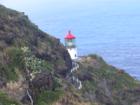 The lighthouse at Makapuu Point as seen from the trail leading up to the top of Makapuu.  The trail is paved and is family friendly.  You can walk, ride a bike or push a stroller to the top.