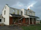 Another Lancaster County farmhouse 
      bites the dust.  Rohrerstown. Photo by Brian Schulman