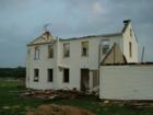 Another Lancaster County farmhouse 
      bites the dust.  Rohrerstown. Photo by Brian Schulman