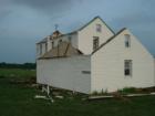 Another Lancaster County farmhouse 
      bites the dust.  Rohrerstown. Photo by Brian Schulman