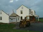 Another Lancaster County farmhouse 
      bites the dust.  Rohrerstown. Photo by Brian Schulman
