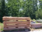 Wood racked for drying outside the Madeline Island sawmill, LaPointe, Wisconsin