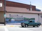 Mural decorates the side of a building in Prescott's commercial district