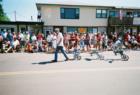 Fourth of July parade passes Ed's Island Store on Main Street, LaPointe, Wisconsin