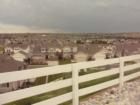 View of the neighborhood looking south (with a storm moving in!)