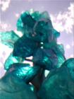 Glass artwork by artist Dale Chihuli along pedestrian bridge to the Museum of Glass