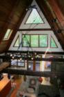 Pictures of the 20' high beamed ceilings can only begin to describe how beautiful this home really is. 