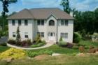 This custom lake front colonial, built in 2001, has the luxuries that today\'s buyers expect. 
      