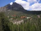 Some Luxury Homes Nestled in the Mountains amid Pine Trees