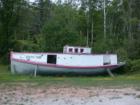 Fishing boat "South Twin" next to Peterson's Foods in Red Cliff, Wisconsin