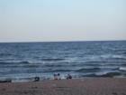 Kids frolicking on the beach at Wisconsin Point, Superior, Wisconsin
