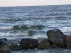 Waves breaking against the rocks at Wisconsin Point beach
