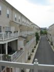 Backside of townhouses w/garages in Cameron Station