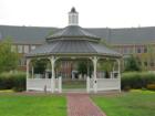 The big gazebo in Cameron Station with townhouses in the background.