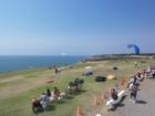 Spectators at the Torrey Pines Gliderport in La Jolla watching hangliders take off