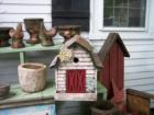 An antique shop display of Birdhouses