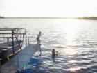 Moira Lake- Jumping off the dock in the evening.