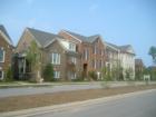 Amberly has several new neighborhoods with different architecture styles.  This photo depicts the newly constructed Brownstone's in Village Square