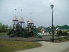 Picture of Cameron Pond playgroud, pool, and clubhouse.  Cameron Pond also has a basketball hoop, too.