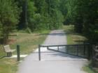 Picture of the greenway in Park Village.  This community has a playground, swimming, greenways, and a clubhouse.