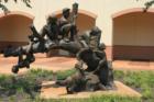 Kids on tree statue located at Indian Hills Shopping Center