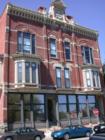 Modern reflective windows combine contemporary utility with classic architecture in this historic Stillwater building.