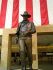 John Wayne, The "Duke" stands greeting visitors at the John Wayne Orange County Airport.