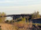 "Old Woody" - This old wooden bridge just south of town was the only bridge over the C&EI railroad tracks for at least 20 miles.  Is was closed to traffic and is not likely to be repaired.