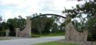 Entrance to an 84 acre parcel of land that is perfect for a beautiful  equestrian farm.  This property is full of natural palm trees and moss filledoak trees 