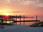AMAZING sunset views can be caught daily from Sailor's Gill or Juana's Bar.  Why not live where you vacation?  Contact Liz Streed at 850-368-7735, or start your search online at: www.surf4turf.net 