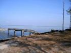 A second view of the Driftwood Estates community dock and Choctawhatchee Bay access lot to be improved when clear title is obtained by the Homeowners Association.