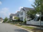 Tree lined streets with Charleston Style Home adorn Carpenter Village