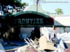Trash and broken furniture outside of the Frontier Hotel in Las Vegas.  The Frontier is preparing for implosion and is set to be replaced by The Plaza Hotel out of New York.  Pic taken August 2007