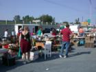 Vendors display their goods at a weekly Flea Market in front of the Medina Ballroom on a Sunday morning
