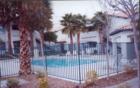 Pool Areas are grted for privacy...each pool has a deck with patio furniture for your convenienvce and showers for your sanity!
