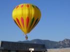 One of the nice things about living in southeast Colorado Springs is that you can watch the hot air ballons from your balcony. The balloons fly so close that you feel like you can reach out and climb into the basket. Labor Day 2007