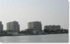 View of Sandpearl and Mandalay Beach Club from the intercoastal waterway at Island Estates 
