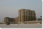 View of Sandpearl Residences and Resorts from the beachside - Luxury condos, hotels and condo hotels 