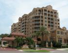 View from Mandalay Avenue of Belle Harbor - it is located at the corner of Mandalay and Baymont - across the street from Sandpearl