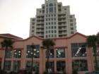 View of the Mandalay Beach Club from Mandalay Ave - Retail Surf shop in foreground.