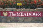Turn into the Meadows - lot 155 is the corner lot on the left.