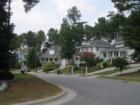 Gorgeous tree lined street in Scotts Mill. These homes are adorable!