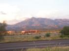 Rincon Mountains at sunset August 28th and a home in Windmill Ridge.