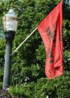 The downtown flags have become a local tradition and now they are welcoming back the Ohio Wesleyan student body.