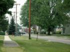 Quiet tree-lined streets highlight Ashley, Ohio.