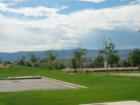 View of the Rocky Mountains from Highlands Ranch Town Center. Neighborhoods in the photo are just to the west of town center - Oakwood Village.