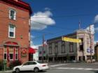 Now the Falls Port Steak House, on the left was once the rather seedy Victorian Inn (at least, when I was a kid it was...) Now it's a very prestigious place to eat.  Across the street is stately Teeter's Furniture, a family business for over a century.