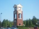 Picture of clock tower at the corner of High House & Cary Parkway. 