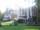Picture of homes lining the golf course in Preston.  
