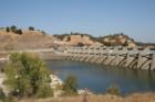 Dam and hillside at the Sac State Aquatic Center, on Sacramento River at Highway 50 and Hazel.